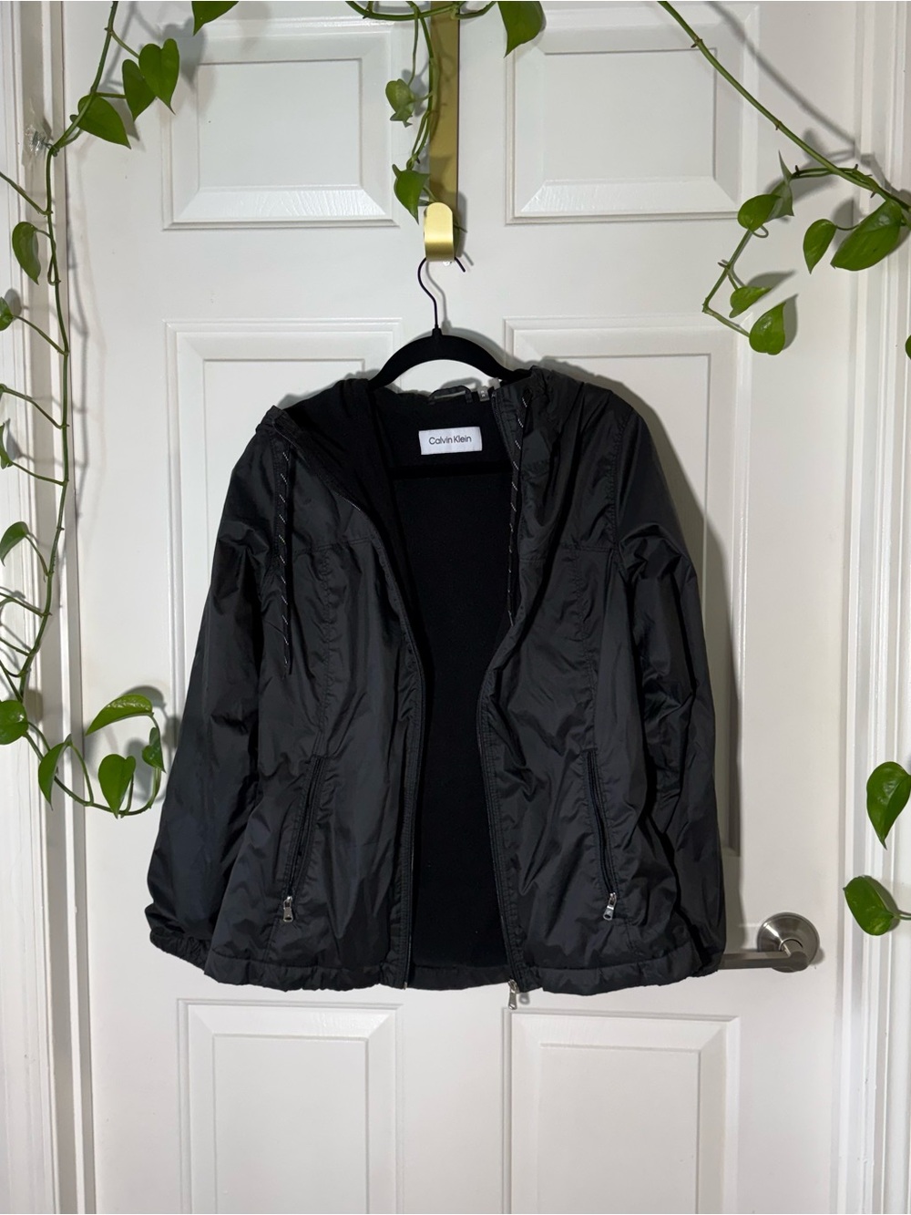 Women’s medium Calvin Klein Black Hooded Windbreaker Fleece Lined Jacket